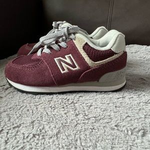 New Balance kids shoes. Size is 7c. Basically brand new